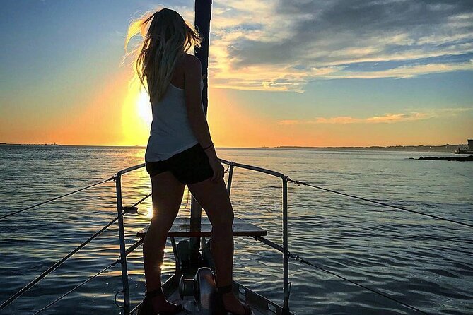 2 Hour Lisbon Sunset and Wine Sailing Tour - Belém Tower and the monuments along the shore