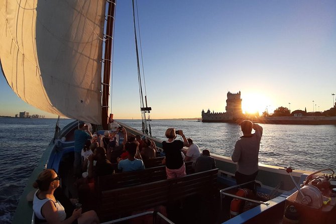 2-Hour Lisbon Traditional Boats Sunset Cruise with White Wine - The boat, seating, and atmosphere