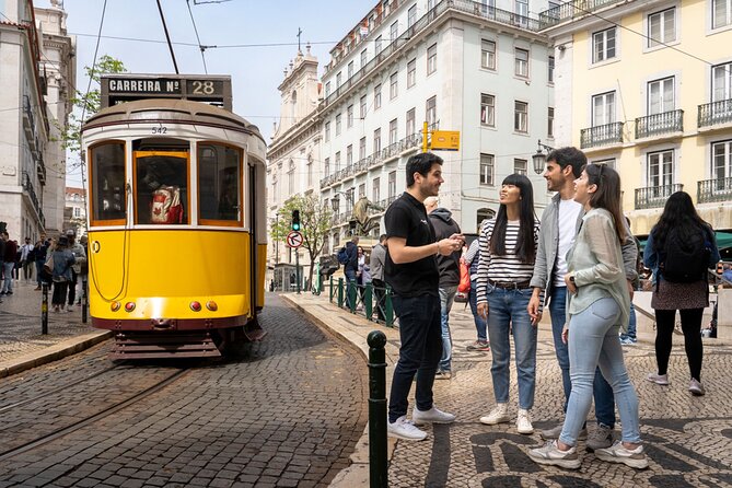 360º Lisbon: Helicopter Flight, Boat Trip and Old Town Walking - Baixa and the Cathedral keep the route moving