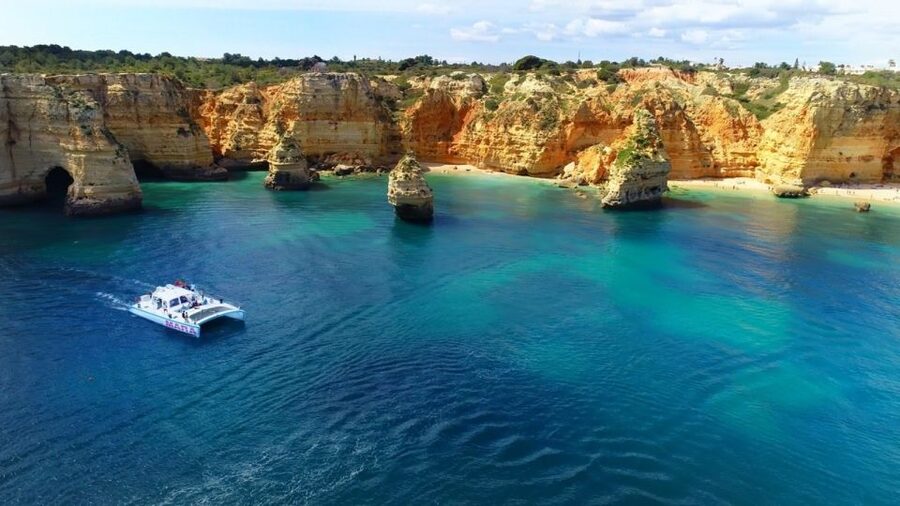 Albufeira: Catamaran Cruise with BBQ & Open Bar on the Beach - From Albufeira Marina toward Benagil