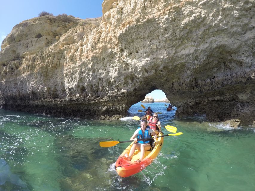 Albufeira: Caves and Cliffs Kayaking Tour - Passing Arrifes and reaching the swimming stop