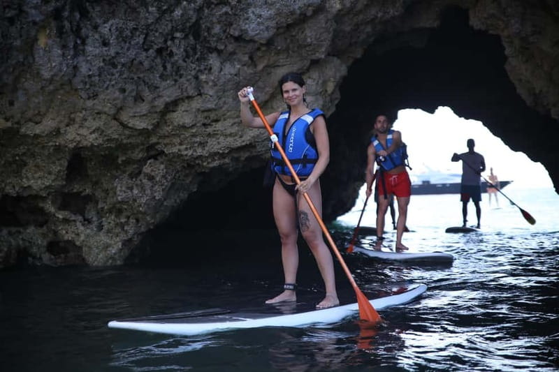 Albufeira: Caves and cliffs Paddleboarding (SUP) Tour - Passing through caves and along rocky coves