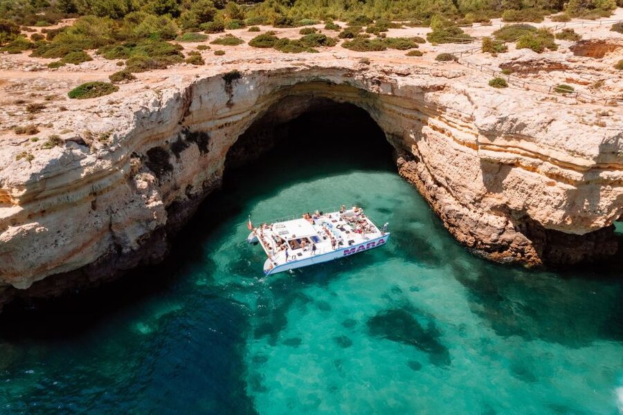 Albufeira: Caves and Coastline Catamaran Cruise to Benagil - The swimming stop and life on deck