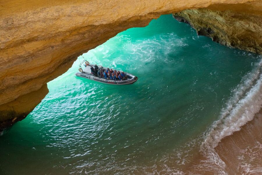 Albufeira: Dolphins, Benagil Caves and Coastline Boat Tour - Racing toward Benagil Cave