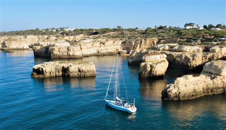 Albufeira: Sailing Boat Cruise BBQ & Open Bar on the Beach - The dinghy trip to nearby caves