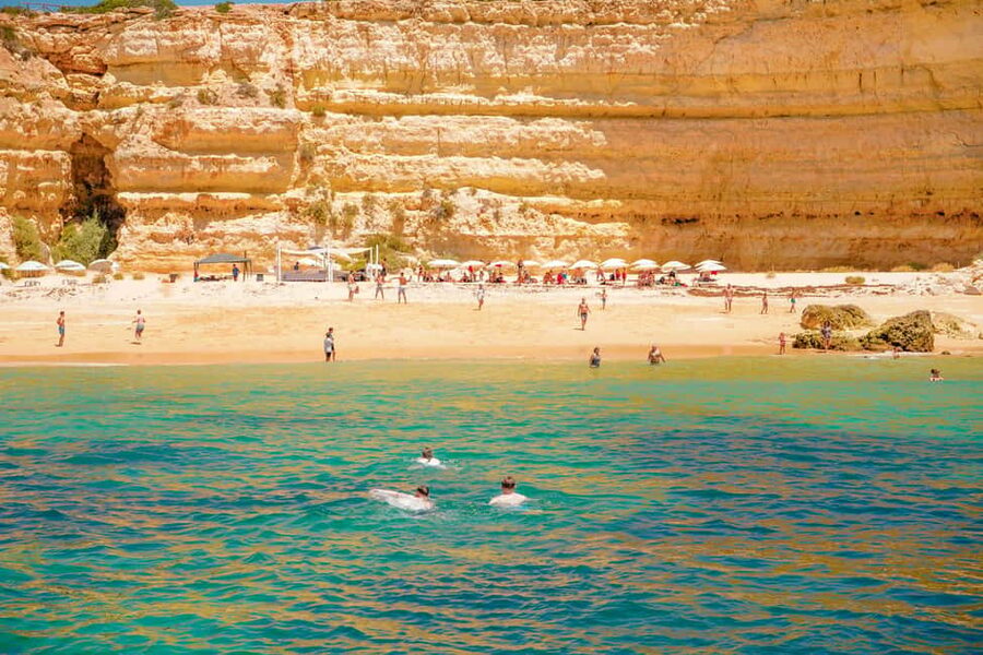 Albufeira: Sightseeing Cruise with Beach BBQ and Open Bar - Arriving at the secluded beach by dinghy