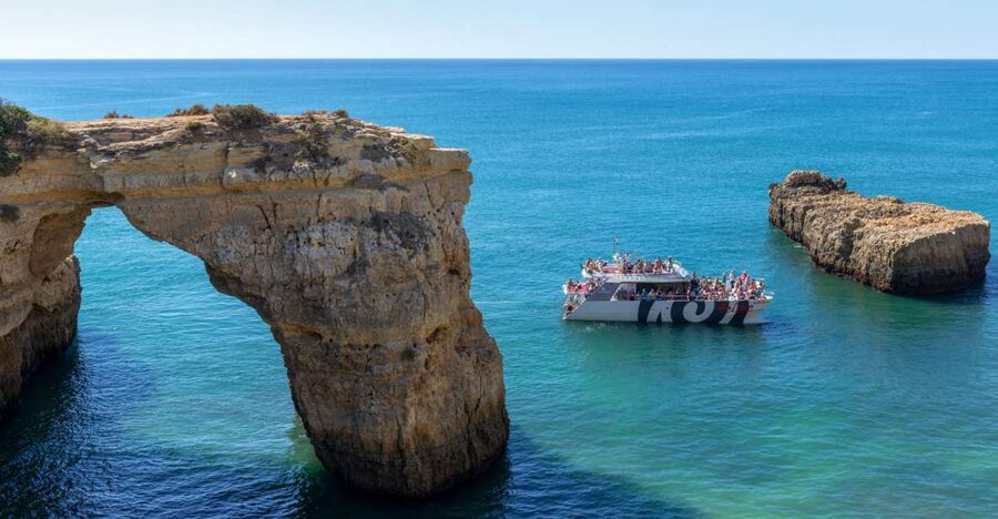 Algarve 3-Hour Caves and Coastline Boat Trip - Reading the Algarve cliffs from the water