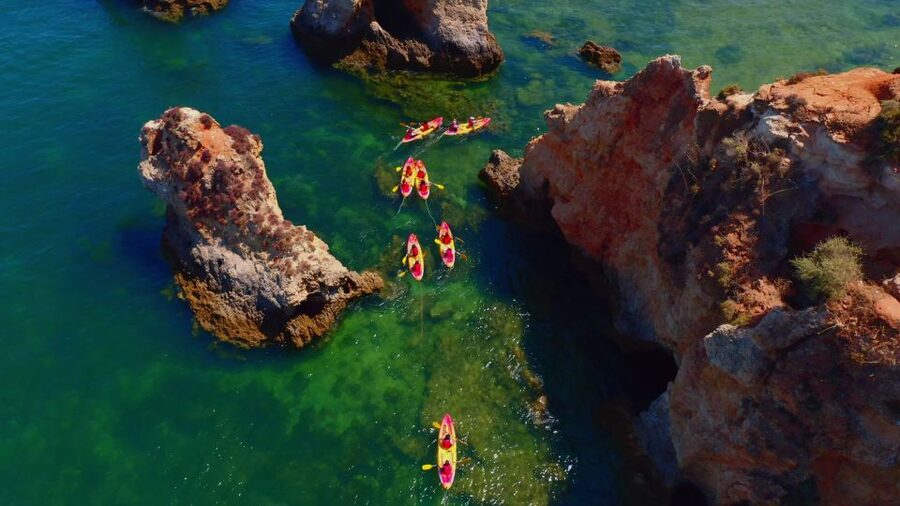 Alvor: Explore Caves Boat and Kayak Tour - The first hour: cruising from Alvor toward Praia do Vau