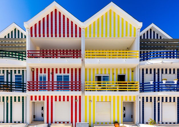 Aveiro and Costa Nova Half Day Tour from Porto with Boat Ride - Aveiro’s canals and the 45-minute moliceiro ride