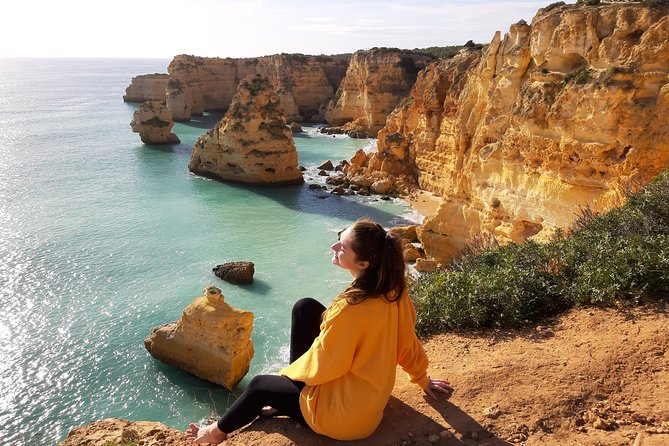 Benagil Cave Tour From Faro - Discover The Algarve Coast - Guides can add warmth, but the style may vary