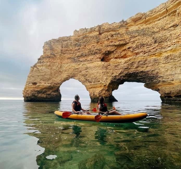 Benagil: Guided Kayak Tour inside caves and Praia da Marinha - Paddling out from Benagil Beach