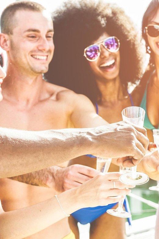 Boat Party to the Beach with Swimming Stops, DJ and Open Bar - Who should book this cruise