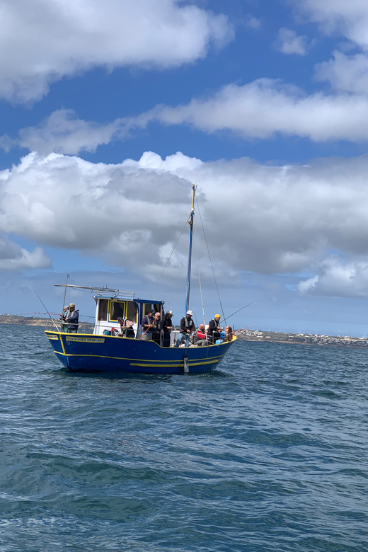 Bottom Fishing Lagos - Cliffs, caves, and dolphins between the fishing stops