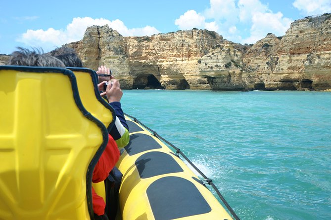 Caves and Dolphin Watching Cruise from Albufeira - Searching for dolphins offshore
