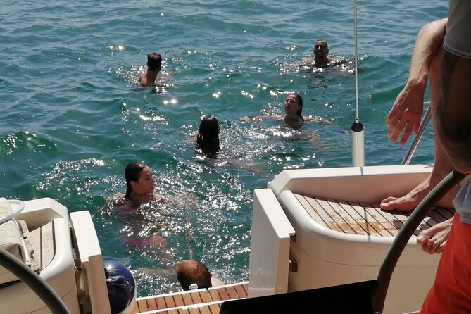 Coastal Tour on a Luxury Sailing Yacht From Vilamoura - Swimming, marine life, drinks, and snacks