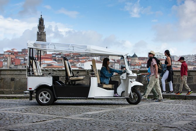 Discover Porto's Highlights on a 2-Hour Private Electric Tuk Tuk - Cross the Ponte do Infante for a wide city view