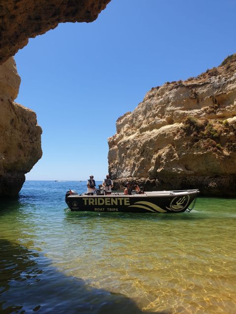 From Armação de Pêra: Benagil Caves and Beaches Boat Tour - The first coves: Beijinhos to Nossa Senhora da Rocha