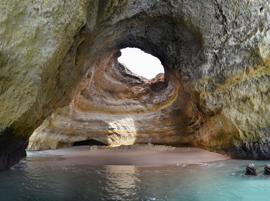 From Carvoeiro: Benagil Caves and Praia da Marinha Boat Trip - Checking in beside Carvoeiro Beach