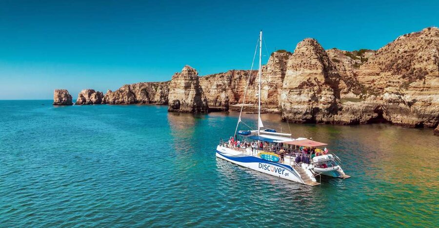 From Lagos: Algarve Golden Coast Cruise - Praia da Luz and the dark rock of the Algarve