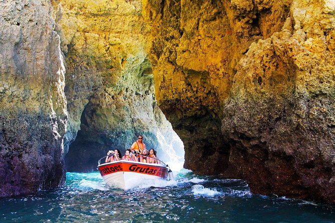 From Lagos: Ponta da Piedade Caves Boat Tour - A purpose-built boat for narrow grottoes