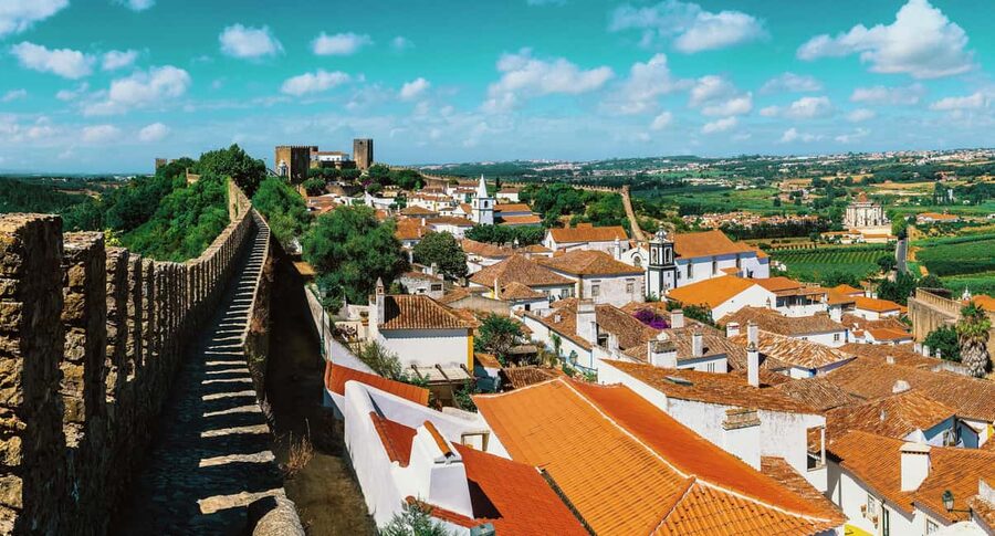 From Lisbon: Nazare Big Waves and Óbidos Guide Day Trip - Sítio, the Chapel of the Memory, and the fishing waterfront