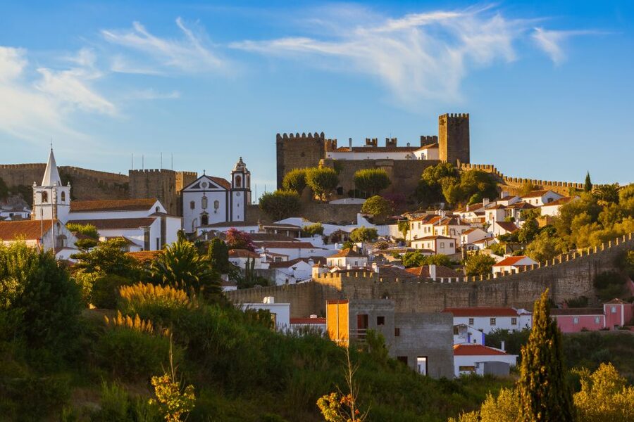 From Lisbon: Private Óbidos and Nazaré Tour - Nazaré Beach brings the town down to earth