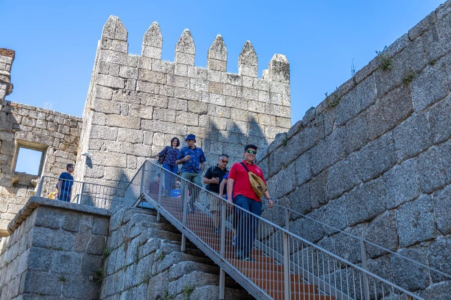 From Porto: Braga and Guimarães Full-Day Trip - Walking through UNESCO-listed Guimarães