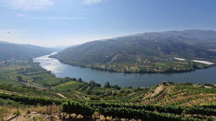 From Porto Day Douro Valley Wine Tour 2 Wine Tasting & Lunch - Leaving Porto in a van for the Douro