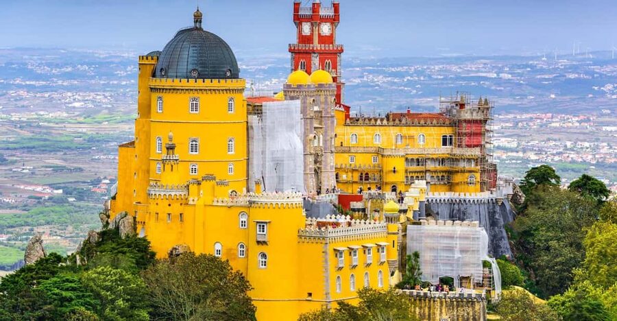 From/To Lisbon: Sintra Hop-on Hop-off Tickets + Audio Guide - Pena Palace and its theatrical hilltop setting