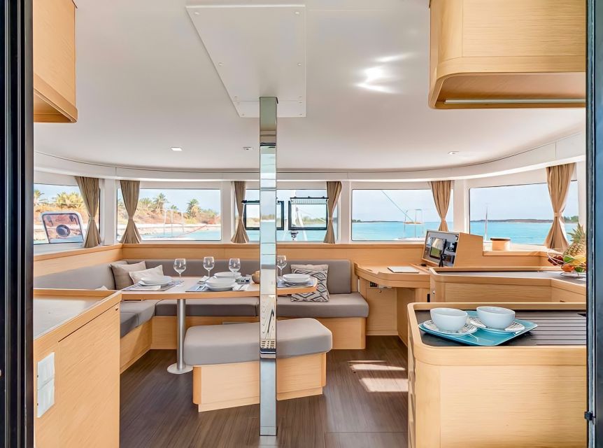 Funchal Bay: Dolphin & Whale Watch Luxury Catamaran Cruise - The Cabo Girão swim beneath 580-meter cliffs