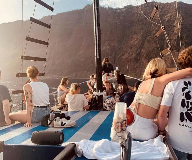 Funchal: Sunset Tour on Traditional Madeiran Boat w/ Drinks - Swimming and snorkeling beneath the cliffs