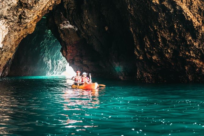 Kayak into the Hidden Caves and Secret Beaches - Paddling past Praia de São Rafael