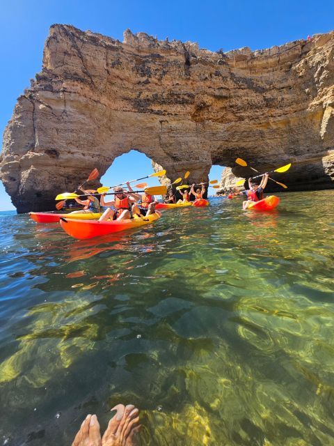 Lagoa: Benagil Cave and Marinha Beach Guided Kayaking Tour - Passing Marinha Beach and its golden arches