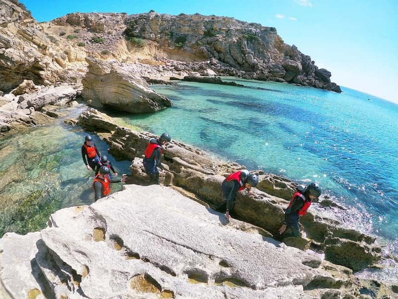Lagos: Algarve Coasteering and Snorkeling Adventure - Three hours of climbing, swimming, and jumping