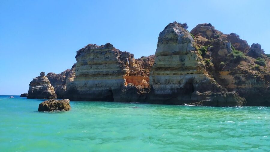 Lagos: Boat Trip to Grottos of Ponta da Piedade and Caves - Following Lagos’s rocky coast