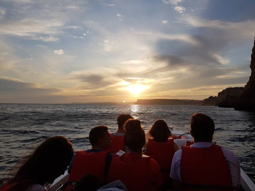Lagos: Guided Ponta da Piedade Sunset Boat Tour - Passing the 1912 lighthouse