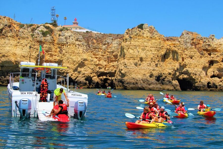 Lagos: Kayaking Tour - Returning to the catamaran for a swim