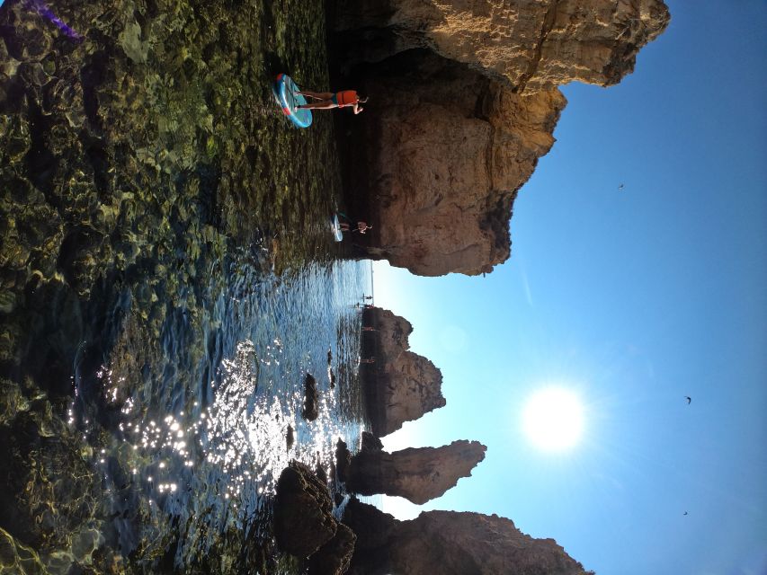 Lagos SUP Caves&Grottoes Tour at Sunrise, Ponta da Piedade - Swimming stops and the optional rock jump