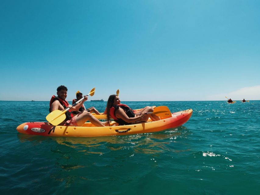 Lisbon: Arrábida Kayak & Wild Beach Snorkeling with Pickup - Snorkeling among fish and starfish