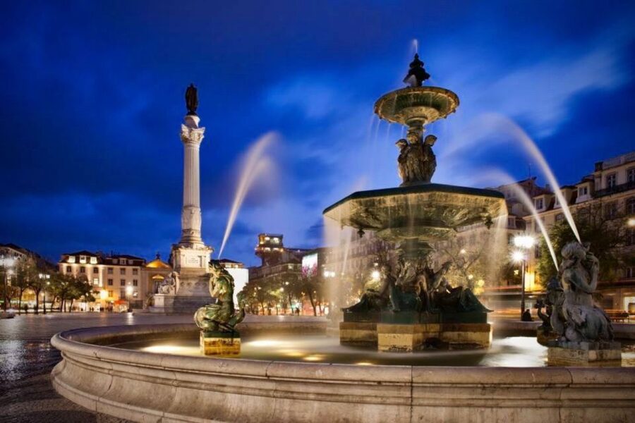 Lisbon: Authentic Fado Show, Dinner and Night Tour - Seeing Lisbon lit up from the minivan