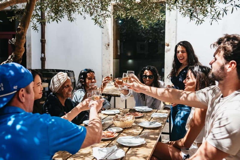 Lisbon: Baixa District Food Tour with Dinner and Drinks - Four drinks, including vinho verde and ginjinha