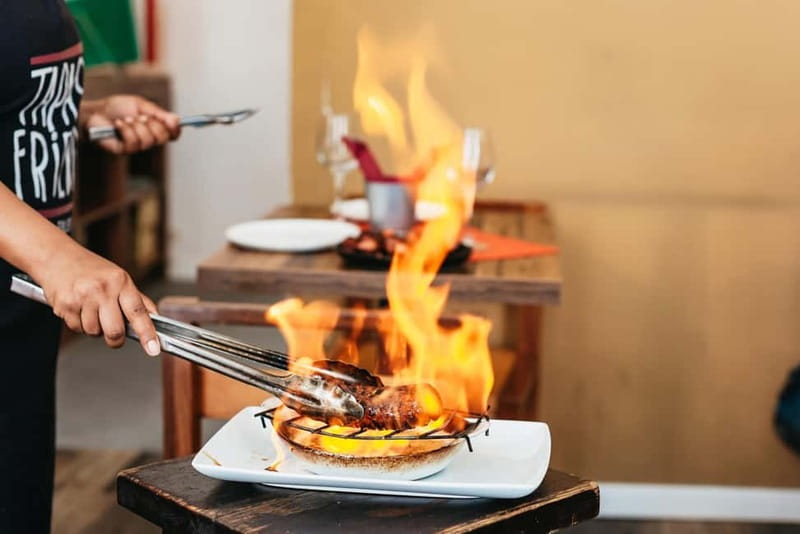 Lisbon: Baixa District Food Tour with Dinner and Drinks - Rossio and St. Dominic’s Square between tastings