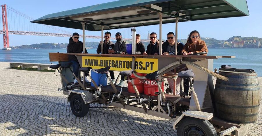 Lisbon: Beer Bike Tour with Sangria and Beer - Pedaling beside the 25th April Bridge