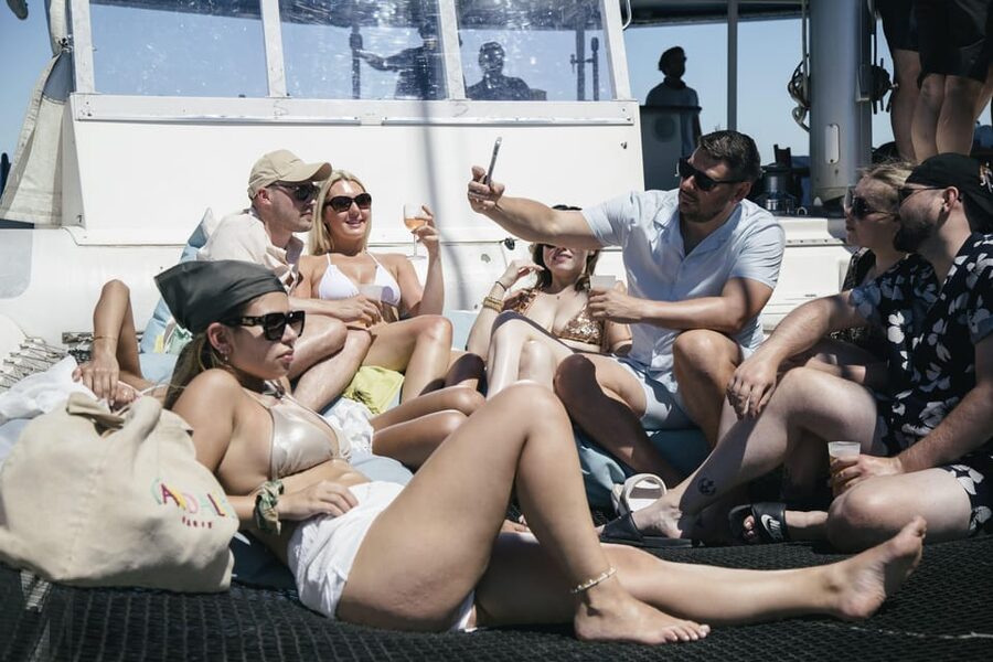 Lisbon: Catamaran Boat Party with Music, Open Bar & Dives - What the $57 price buys you