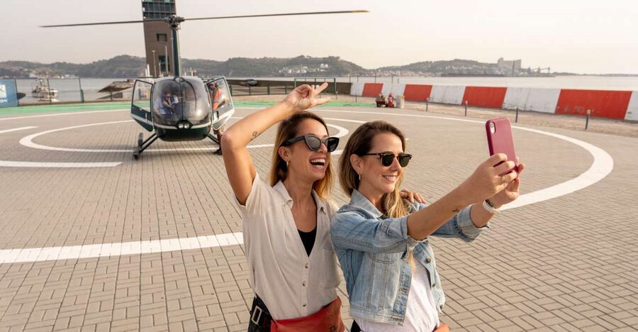 Lisbon: City and Coastline Sightseeing Helicopter Flight - Crossing toward Christ King and the 25th April Bridge