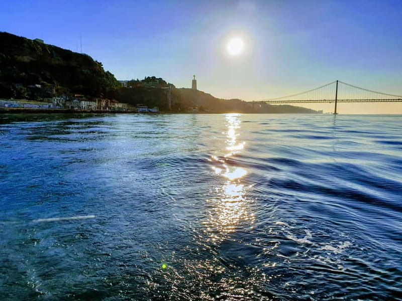 Lisbon: Daytime or Sunset Boat Cruise with History and Wine - Belém Tower and Jerónimos Monastery from the river