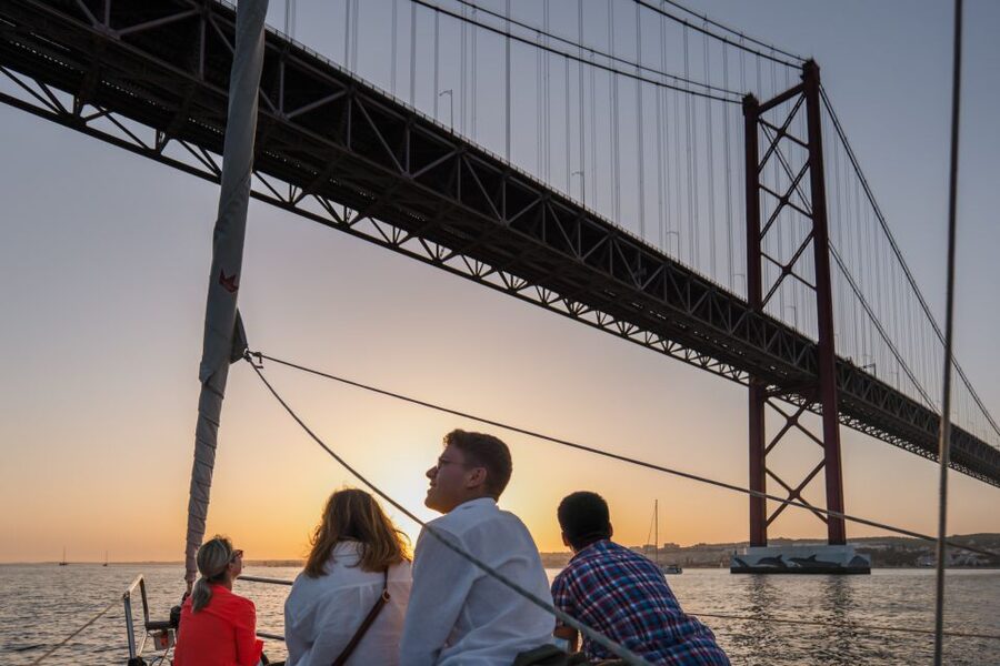 Lisbon: Daytime/Sunset/Night City Sailboat Tour with Drink - What the crew adds to the experience