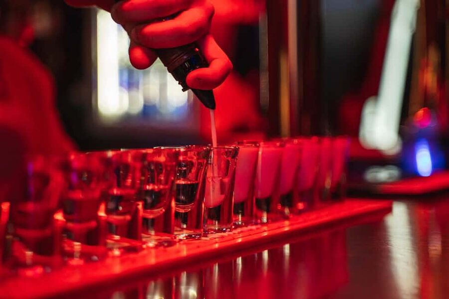 Lisbon: Drunken History Walking Tour with Included Drinks - The first bar may be the evening’s most atmospheric stop