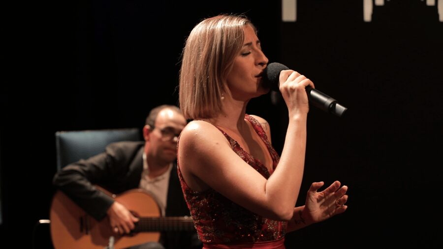 Lisbon: Fado in Chiado Live Show - Lisbon on the screen behind the music