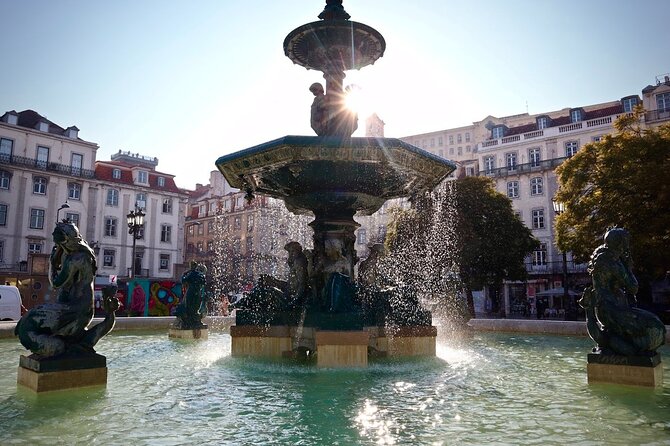 Lisbon Food Tour with 10+ Tastings of Local Delicacies & Wines - The Santa Justa Lift and Lisbon’s steep streets